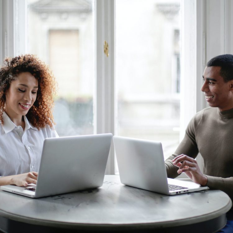 pexels-andrea-piacquadio-3967031 African American adults with their laptops