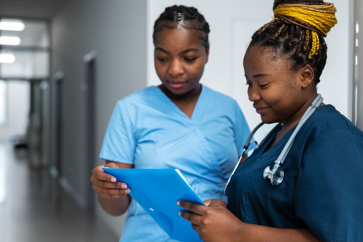 medium-shot-nurses-working-together_23-2149741244